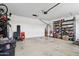 Spacious garage with shelving for storage and room for parking; also includes water heater and hanging bike at 20916 E Via De Arboles --, Queen Creek, AZ 85142