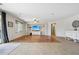 Spacious living area with ceiling fan, tile, hardwood floors, and access to the outdoor patio at 20916 E Via De Arboles --, Queen Creek, AZ 85142