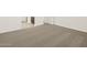 A spacious bedroom area with neutral colored walls and carpet at 24612 W Grenadine Rd, Buckeye, AZ 85326