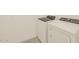 Laundry room featuring a modern washer and dryer set at 24612 W Grenadine Rd, Buckeye, AZ 85326