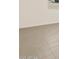 Bright room featuring neutral color palette and tile flooring at 24612 W Grenadine Rd, Buckeye, AZ 85326