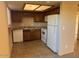 Functional kitchen with essential appliances and ample cabinet space at 2847 N 46Th Ave # 22, Phoenix, AZ 85035