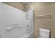 Bathroom featuring a shower and tub combination, along with a toilet at 3360 E Joseph Way, Gilbert, AZ 85295