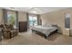 Cozy bedroom featuring a comfortable recliner, a chest of drawers and soft, neutral tones at 3360 E Joseph Way, Gilbert, AZ 85295