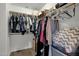 Walk-in closet featuring clothing rods, shelving, and ample storage space at 3360 E Joseph Way, Gilbert, AZ 85295
