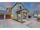 A two-story home with a two-car garage and inviting front porch, perfect for relaxing outdoors at 3360 E Joseph Way, Gilbert, AZ 85295