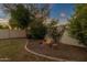 Backyard fire pit with a brick surround and a mulched seating area at 3360 E Joseph Way, Gilbert, AZ 85295