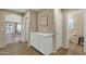Neutral hallway with tile floors, access to multiple rooms, and bright lighting at 3360 E Joseph Way, Gilbert, AZ 85295