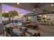 Beautiful backyard with a pool, covered patio featuring seating, and lush landscaping for a serene setting at 3401 N 34Th Pl, Phoenix, AZ 85018