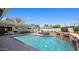 Expansive backyard featuring a refreshing pool, lounge chairs, and a covered patio perfect for outdoor entertaining at 3401 N 34Th Pl, Phoenix, AZ 85018