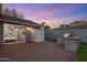 Backyard showcasing an outdoor shower, built-in barbecue, and seamless access to the home's interior, perfect for modern living at 3401 N 34Th Pl, Phoenix, AZ 85018