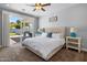 Comfortable bedroom with a sliding glass door leading to the backyard patio at 3401 N 34Th Pl, Phoenix, AZ 85018
