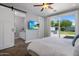 Spacious bedroom featuring an open layout with backyard access and an ensuite bathroom at 3401 N 34Th Pl, Phoenix, AZ 85018