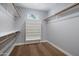 Walk-in closet features carpet, shelving, and hanging rods at 3401 N 34Th Pl, Phoenix, AZ 85018