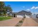 Charming single-Gathering home boasts a spacious driveway and a well-manicured front lawn on a bright day at 3401 N 34Th Pl, Phoenix, AZ 85018