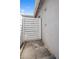 Outdoor shower with white slatted enclosure and modern fixtures providing a refreshing open-air experience at 3401 N 34Th Pl, Phoenix, AZ 85018