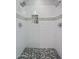 Spacious shower featuring dual shower heads, stylish mosaic accents, and white subway tile at 3401 N 34Th Pl, Phoenix, AZ 85018