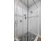 This shower boasts white subway tile, stylish mosaic accents, and a sleek glass enclosure at 3401 N 34Th Pl, Phoenix, AZ 85018
