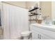 Bright bathroom featuring a large vanity with white cabinets, modern fixtures, and a shower with tub at 3485 E Silo Dr, Gilbert, AZ 85296