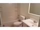 Bathroom featuring a standard white toilet, sink, and shower-tub combo at 3526 W Dunlap Ave # 161, Phoenix, AZ 85051