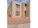 Two-story stucco condo featuring well-maintained landscaping with desert rock, in a vibrant community at 3526 W Dunlap Ave # 161, Phoenix, AZ 85051