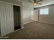 Bedroom featuring large closet and carpeted floors at 3739 W Mission Ln, Phoenix, AZ 85051