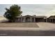 Charming single-story home featuring desert landscaping, covered entryway, and an extended driveway at 3739 W Mission Ln, Phoenix, AZ 85051