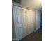 Hallway with closet featuring paneled doors, and an adjacent entry way at 3739 W Mission Ln, Phoenix, AZ 85051