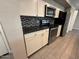 Modern kitchen featuring stainless steel appliances and granite countertops at 3739 W Mission Ln, Phoenix, AZ 85051