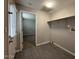 Functional laundry room with tile flooring and access to outside at 3739 W Mission Ln, Phoenix, AZ 85051