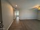 Open-concept living area with tile flooring, neutral paint, and recessed lighting at 3739 W Mission Ln, Phoenix, AZ 85051