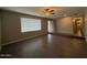 Bright living room boasting tile floors, large windows, and an inviting entryway at 3739 W Mission Ln, Phoenix, AZ 85051