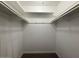 Walk-in closet featuring installed shelving and space for storage at 3739 W Mission Ln, Phoenix, AZ 85051