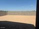 Expansive backyard with block wall fencing, offering a private outdoor space at 3822 S 87Th Dr, Tolleson, AZ 85353