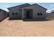 Open backyard showcasing a patio area and block wall for privacy at 3822 S 87Th Dr, Tolleson, AZ 85353