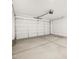 Clean and spacious garage with an automatic door opener at 3822 S 87Th Dr, Tolleson, AZ 85353
