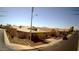 Charming single-story home with desert landscaping, tile roof, and two-car garage in a neighborhood setting at 4405 W Park St, Laveen, AZ 85339