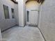 Inviting front porch with modern windows and a secure front door, offering a private entryway to the home at 4405 W Park St, Laveen, AZ 85339