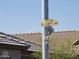 Street sign indicating S 44th Ave and W Park St with a view of nearby rooftops at 4405 W Park St, Laveen, AZ 85339