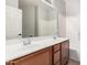 Double sink bathroom boasts a large vanity, white countertops, and a shower/tub combo at 5108 N 191St Dr, Litchfield Park, AZ 85340
