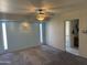 Bedroom featuring light blue walls and an ensuite bathroom at 518 W Beverly Ln, Phoenix, AZ 85023