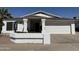Charming single-story home with a well-maintained front yard and a two-car garage at 518 W Beverly Ln, Phoenix, AZ 85023