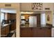 Galley kitchen featuring tile floors, wooden cabinets and granite countertops at 518 W Beverly Ln, Phoenix, AZ 85023