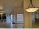 Spacious open living area with large windows and view to the backyard pool at 518 W Beverly Ln, Phoenix, AZ 85023