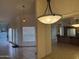 Bright open living area with large windows, open to the kitchen at 518 W Beverly Ln, Phoenix, AZ 85023