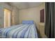 Cozy bedroom with view to the doorway at 7750 E Broadway Rd # 225, Mesa, AZ 85208