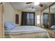 Comfortable bedroom with ample natural light and closet space at 7750 E Broadway Rd # 225, Mesa, AZ 85208