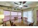 Traditional dining area with ceiling fan and natural light at 7750 E Broadway Rd # 225, Mesa, AZ 85208