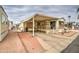 Exterior side view of a home with covered porch, landscape, driveway and street view at 7750 E Broadway Rd # 225, Mesa, AZ 85208