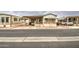 Street view of a mobile home and community with a paved road and a stone yard at 7750 E Broadway Rd # 225, Mesa, AZ 85208